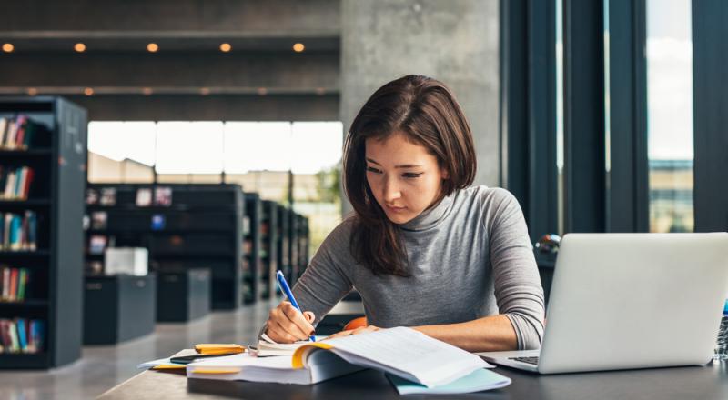 College Student with Laptop