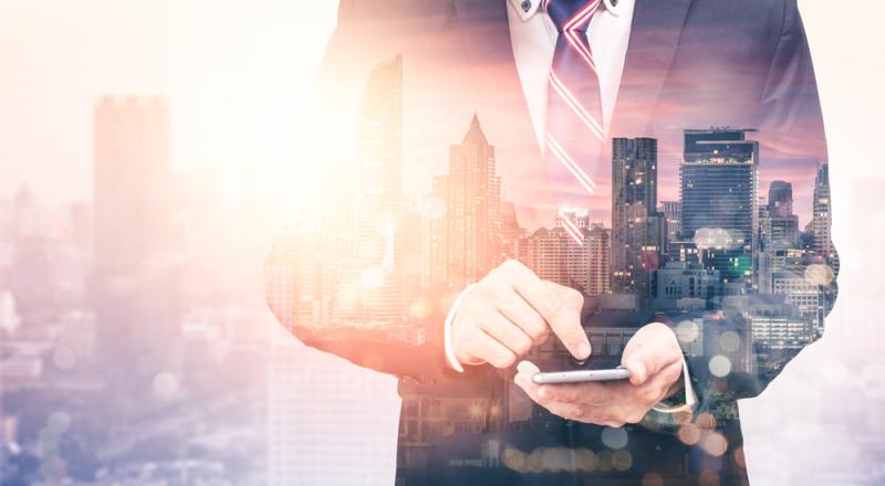 Man Looking at Future of Work in City