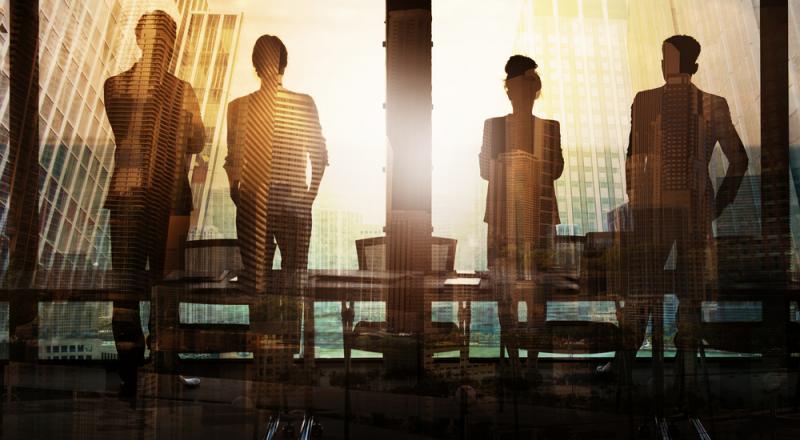 Group of Executives Using BlueJeans