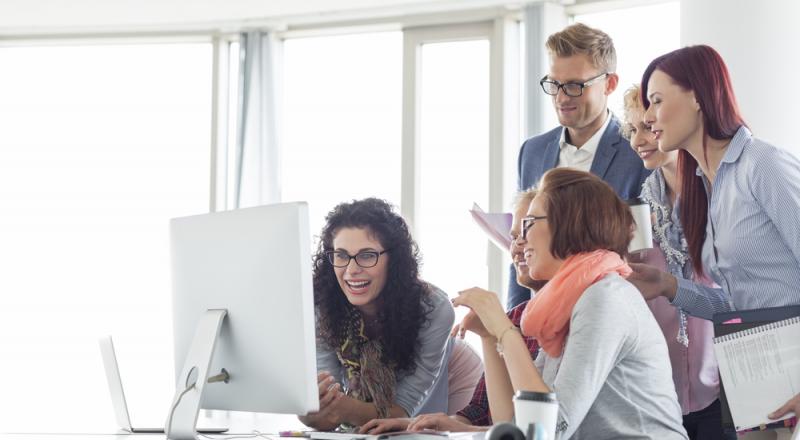 Team Looking at Computer